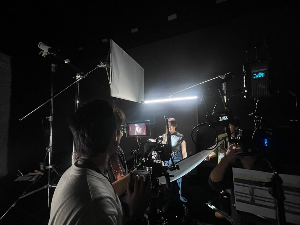 Close-up photo of a bookshelf with old books.