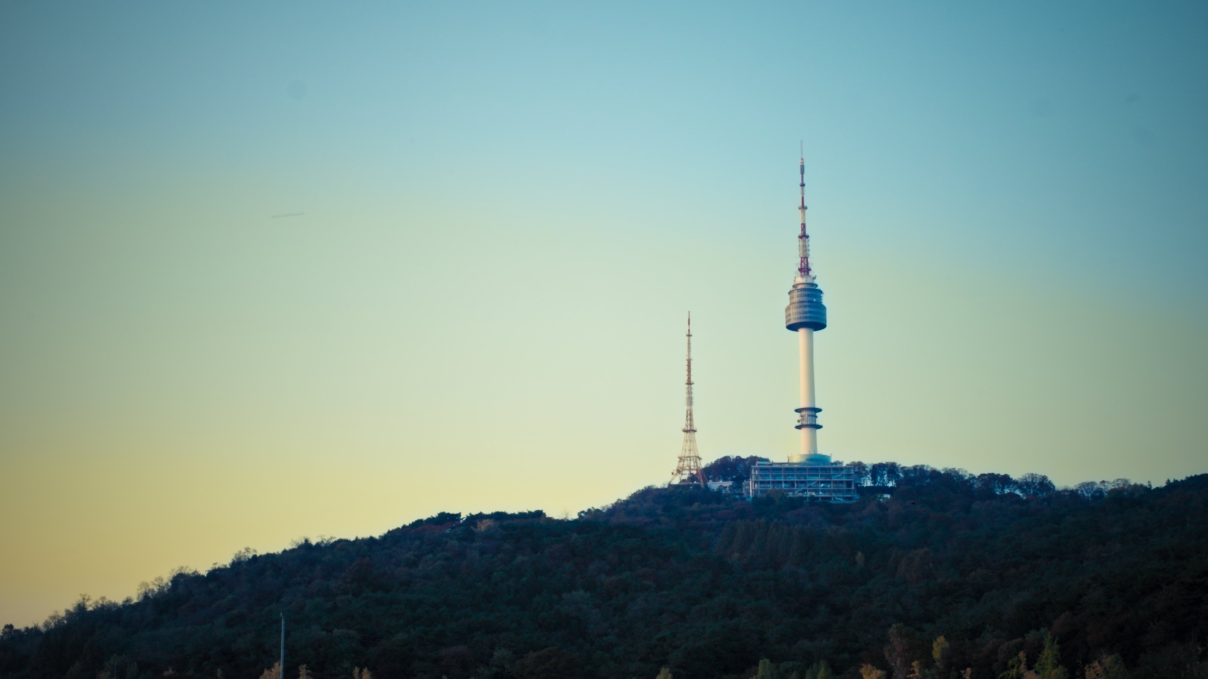 Close-up photo of a bookshelf with old books.